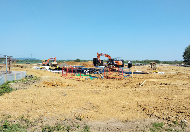 Machinery carrying out work at Highgrove Farm Bosham